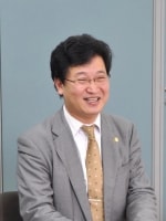 金尾 基樹弁護士