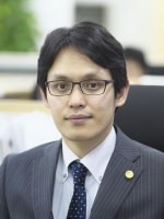 洪 勝吉弁護士