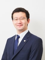 新 英樹弁護士