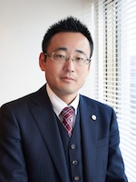 吉直 達法弁護士