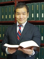 米津 義尚弁護士